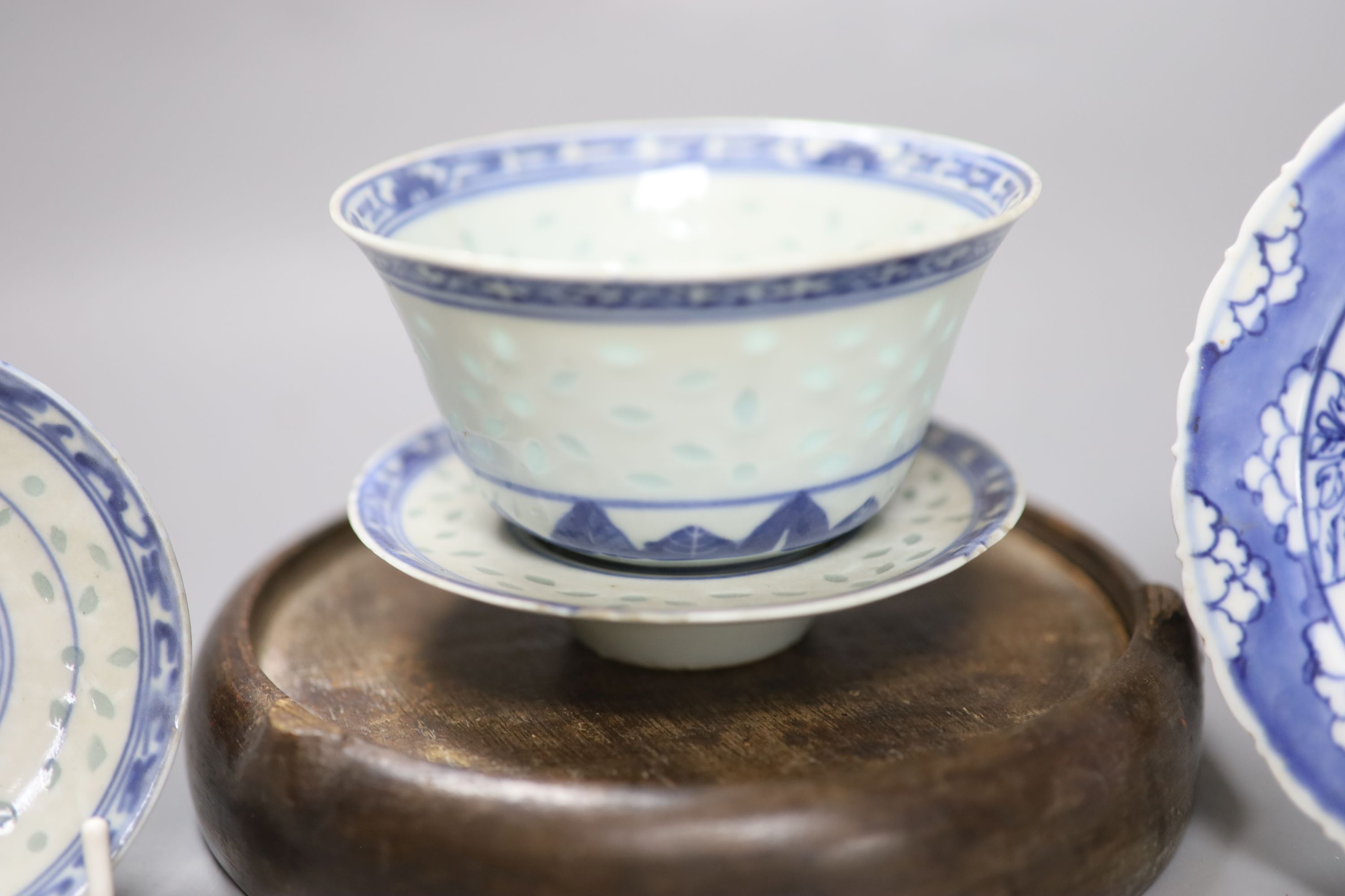 A group of Chinese blue and white wares, including a Chinese blue and white dish, a similar pedestal dish and a tea bowl and saucer, to